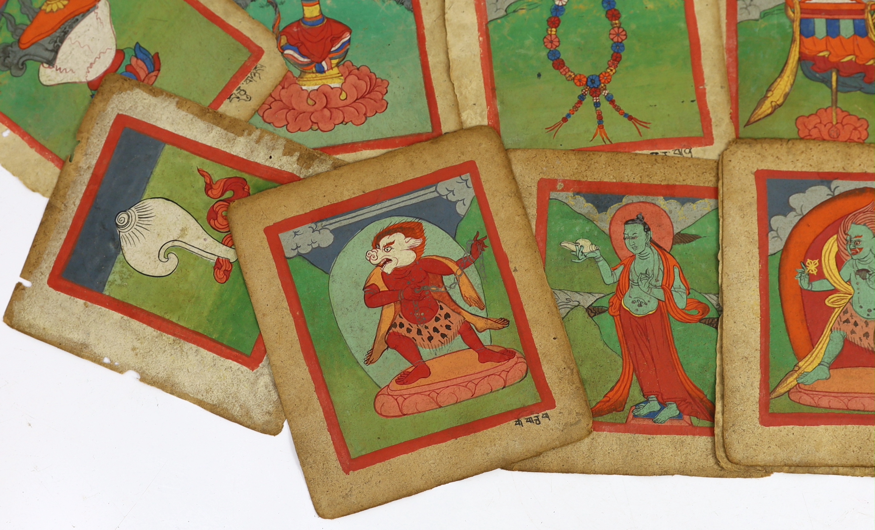 A set of thirty six Tibetan painted thangka pages, 19th century